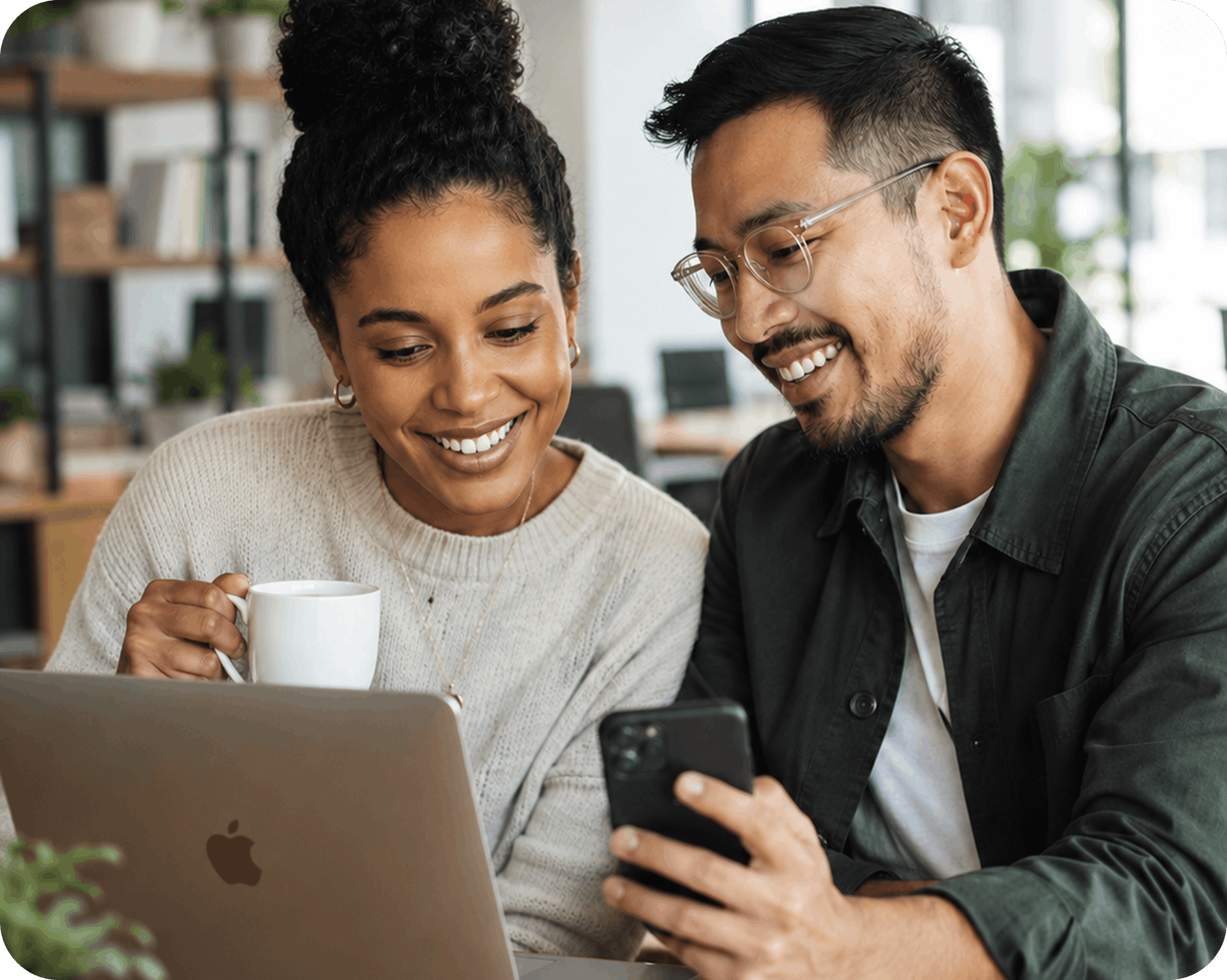 Two members reviewing their finances on a laptop